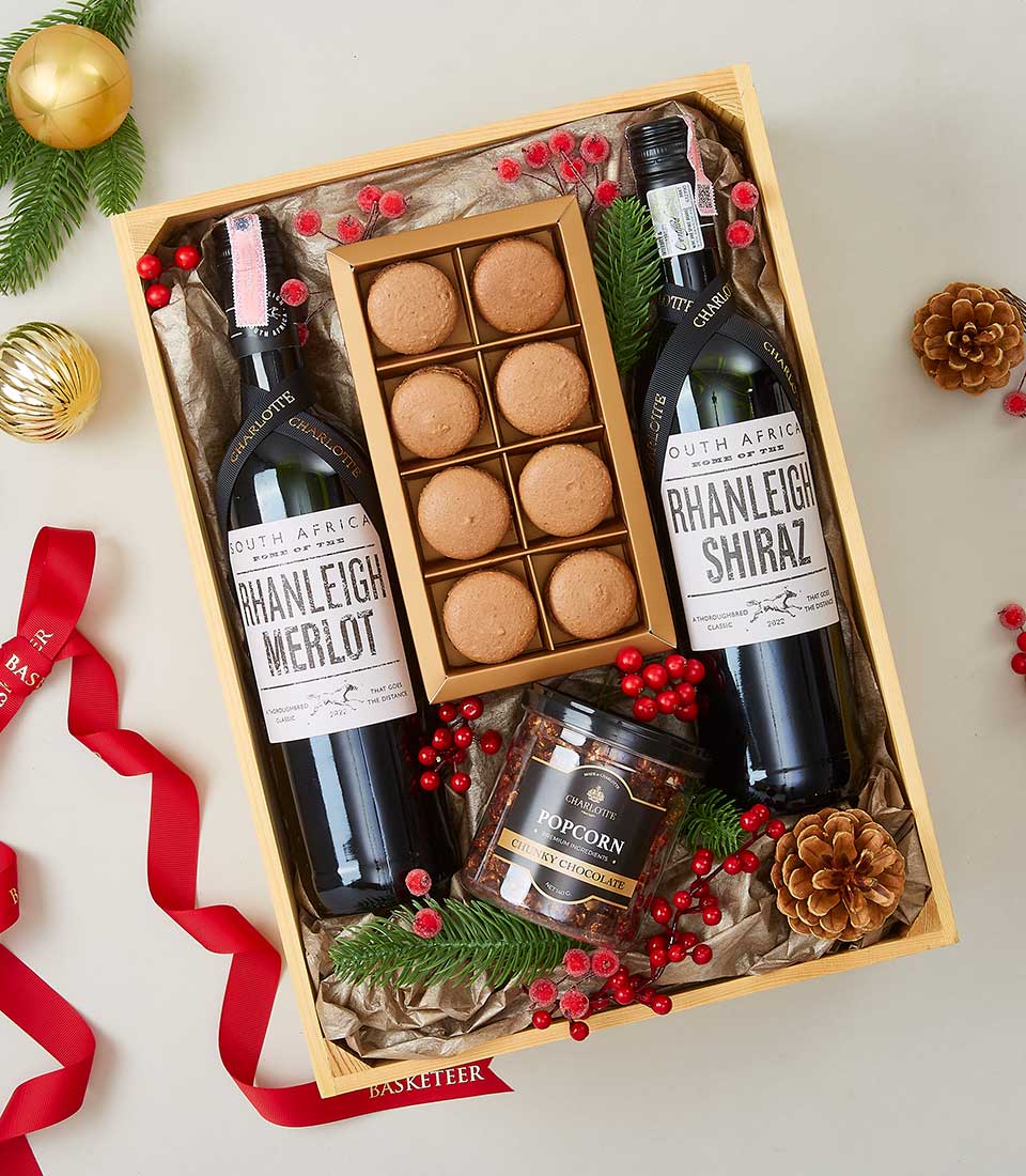 A lavish Basketeer gift box artfully crafted for the discerning connoisseur. Nestled within, two exquisite bottles of 
