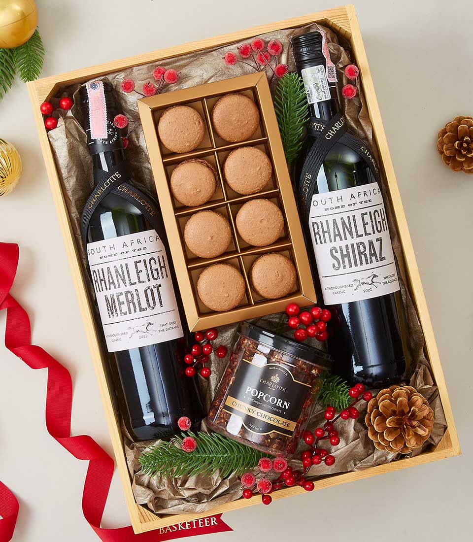 A luxurious holiday gift box from Basketeer featuring two exquisite bottles of wine, 