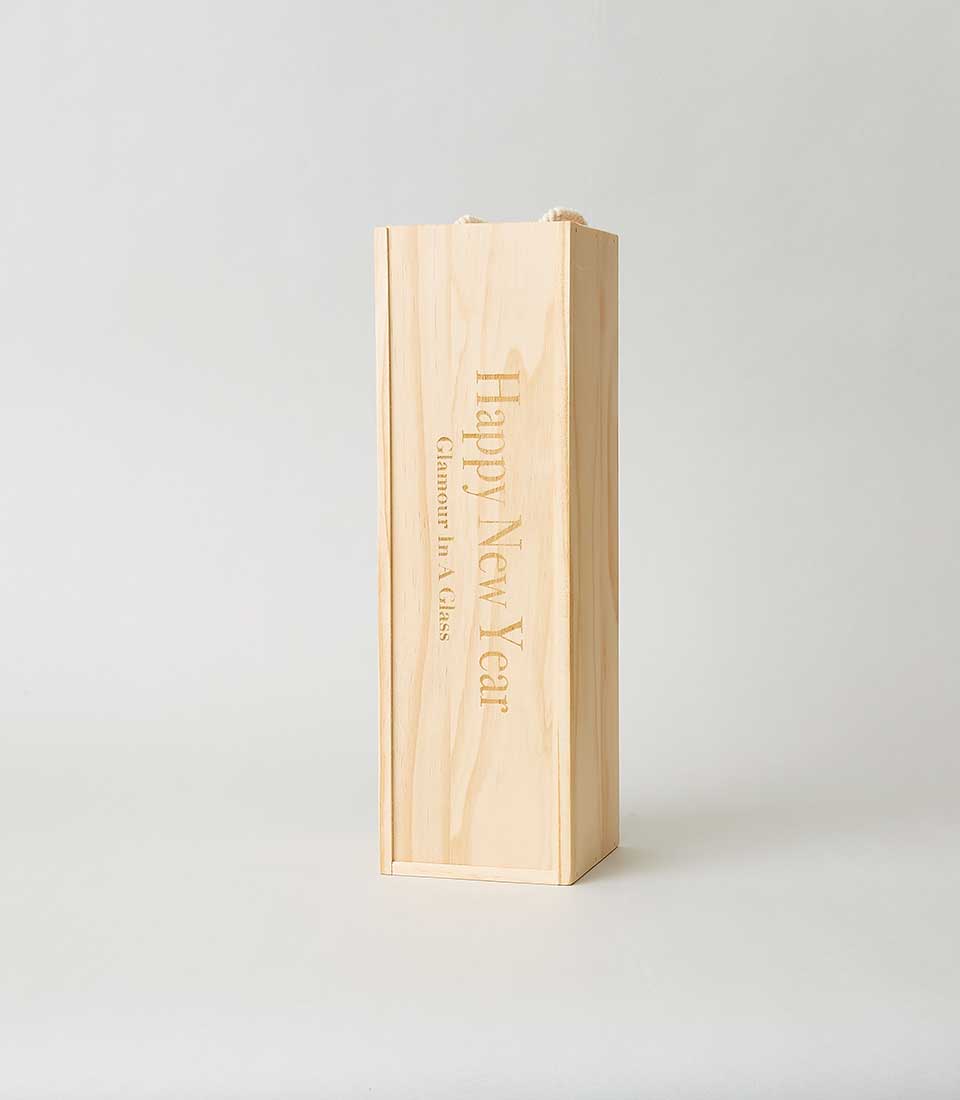 A refined wooden rectangular box, elegantly engraved with 