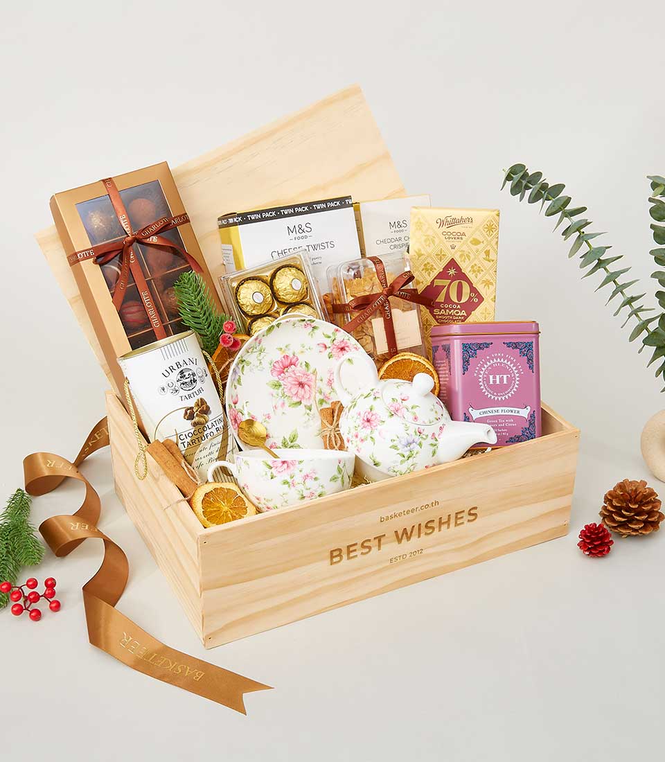 A luxurious wooden gift box labeled 