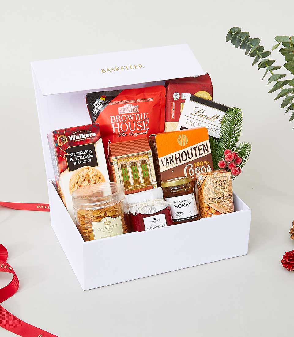 A sumptuous white gift box, elegantly branded with 