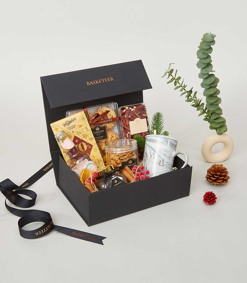 A luxurious black gift box emblazoned with the prestigious 