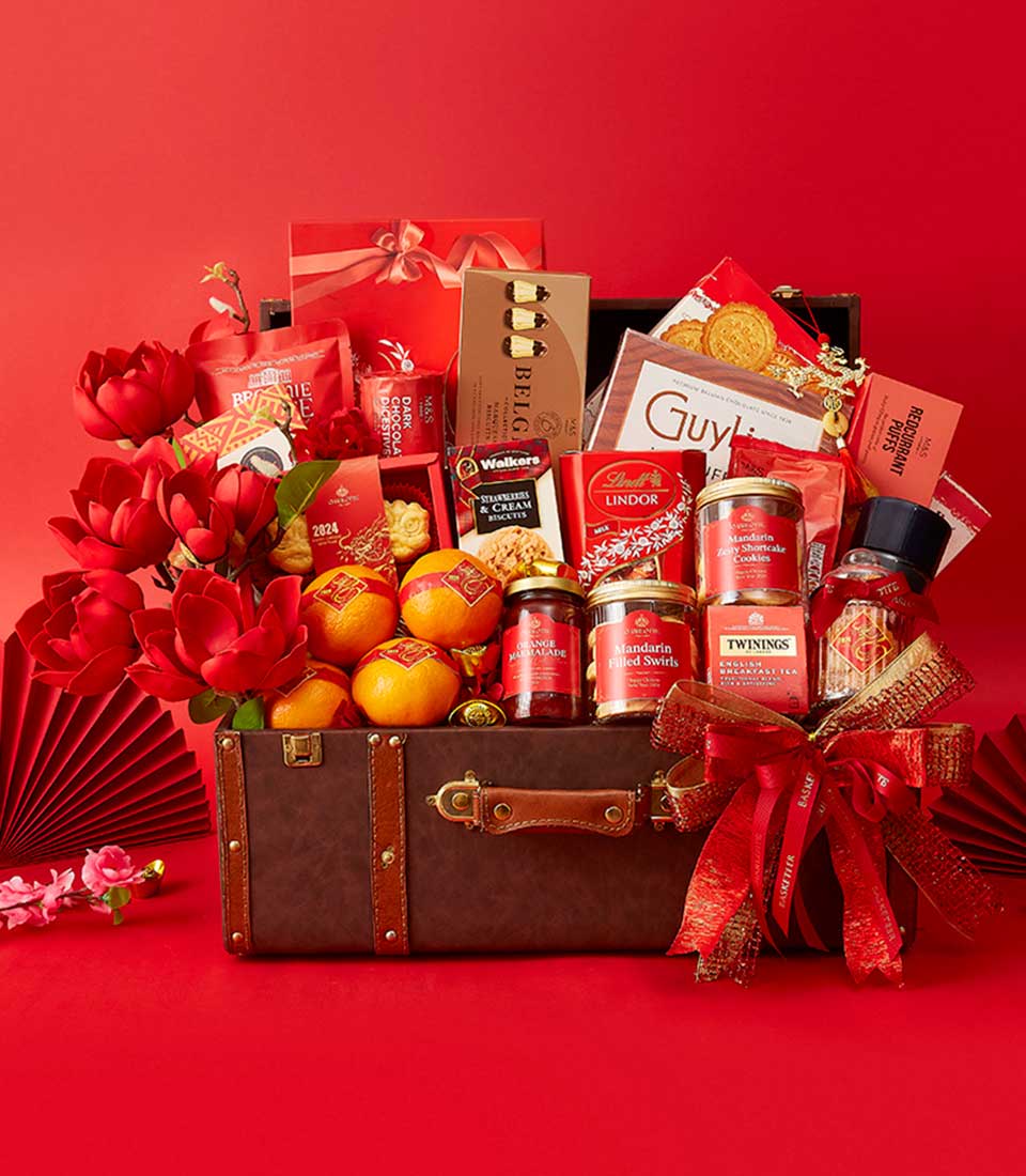 Chinese New Year Gift In Mandarin Orange, Cookies, Biscuits, Crackers, Dragon Statue and Many Treats Delicious In The Brown Hamper We also Decorate it in Red and Gold.
