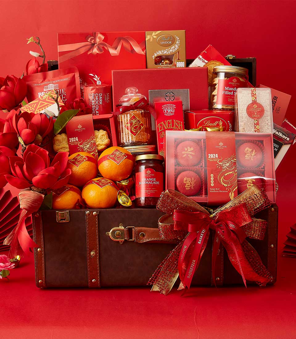 Chinese New Year Gift In Mandarin Orange, Cookies, Dragon Cookies, Macarons, Short Cake, Honey, Bird's Nest, Tea and Many Treats Delicious In The Brown Hamper We also Decorate it in Red and Gold.