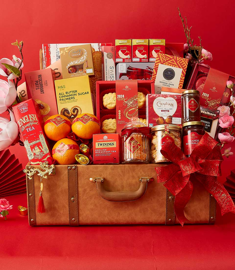 Chinese New Year Gift In Mandarin Orange, Cookies, Dragon Cookies, Bird's Nest, Chocolate and Many Treats Delicious In The Brown Hamper We also Decorate it in Red and Gold.