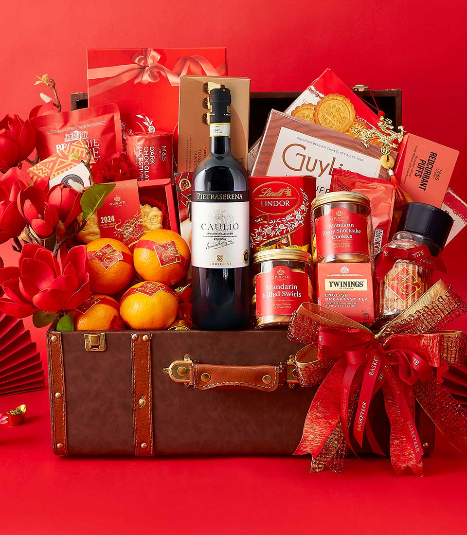 Chinese New Year Gift In Wine, Mandarin Orange, Cookies, Dragon Cookies, Chocolate and Many Treats Delicious In The Brown Hamper We also Decorate it in Red and Gold.