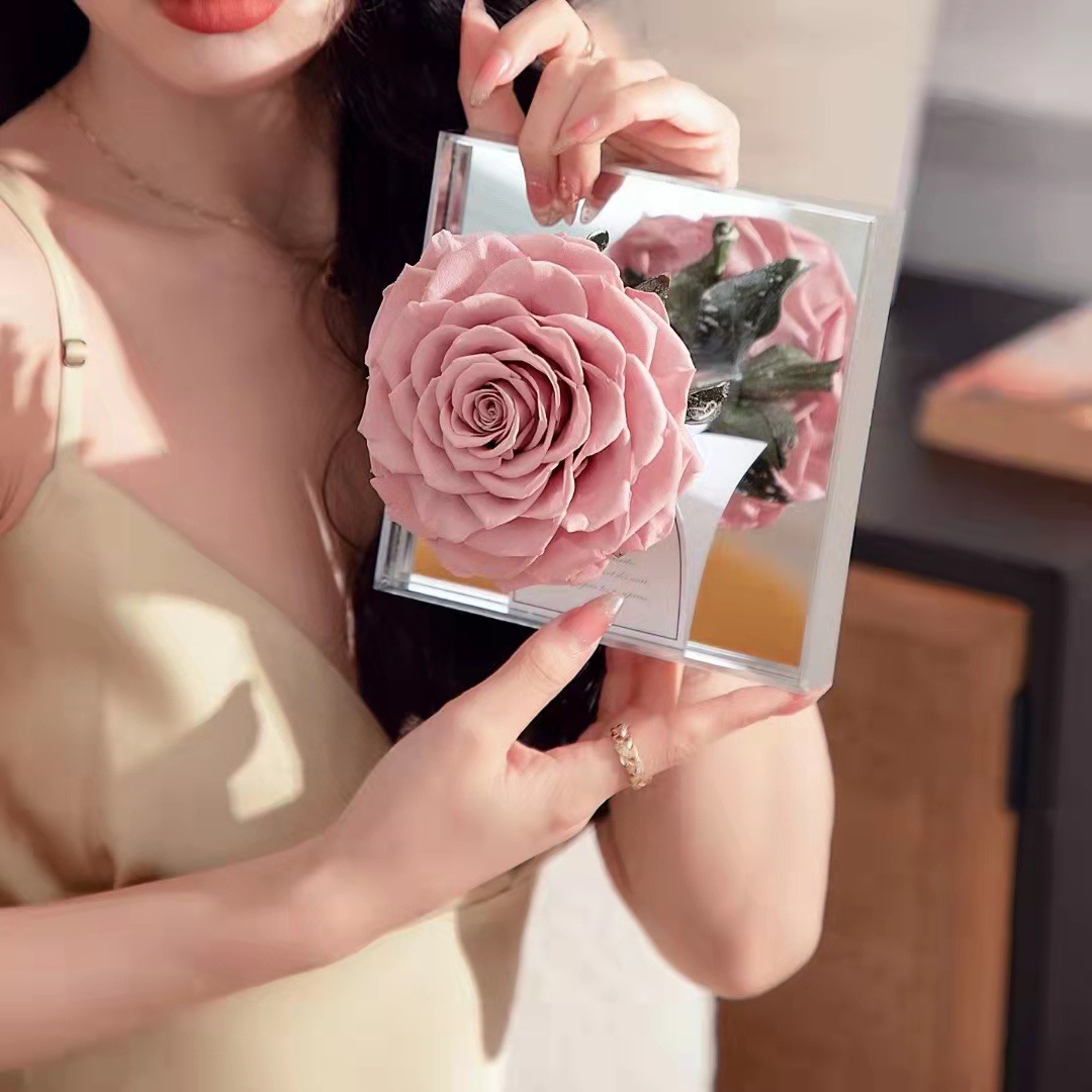 Discover the exquisite charm of our preserved pink roses gift box. Each rose is delicately preserved to retain its soft pink hue and delicate petals, creating a lasting symbol of beauty and affection.