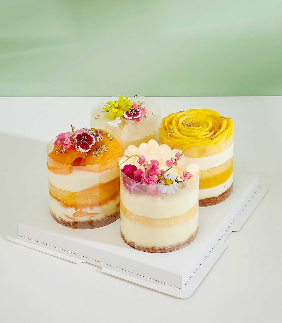 Indulge in our irresistible Mixed Fruit Mini Layer Cakes! Made with a medley of fresh fruits and moist cake layers. Order now for a fruity delight!