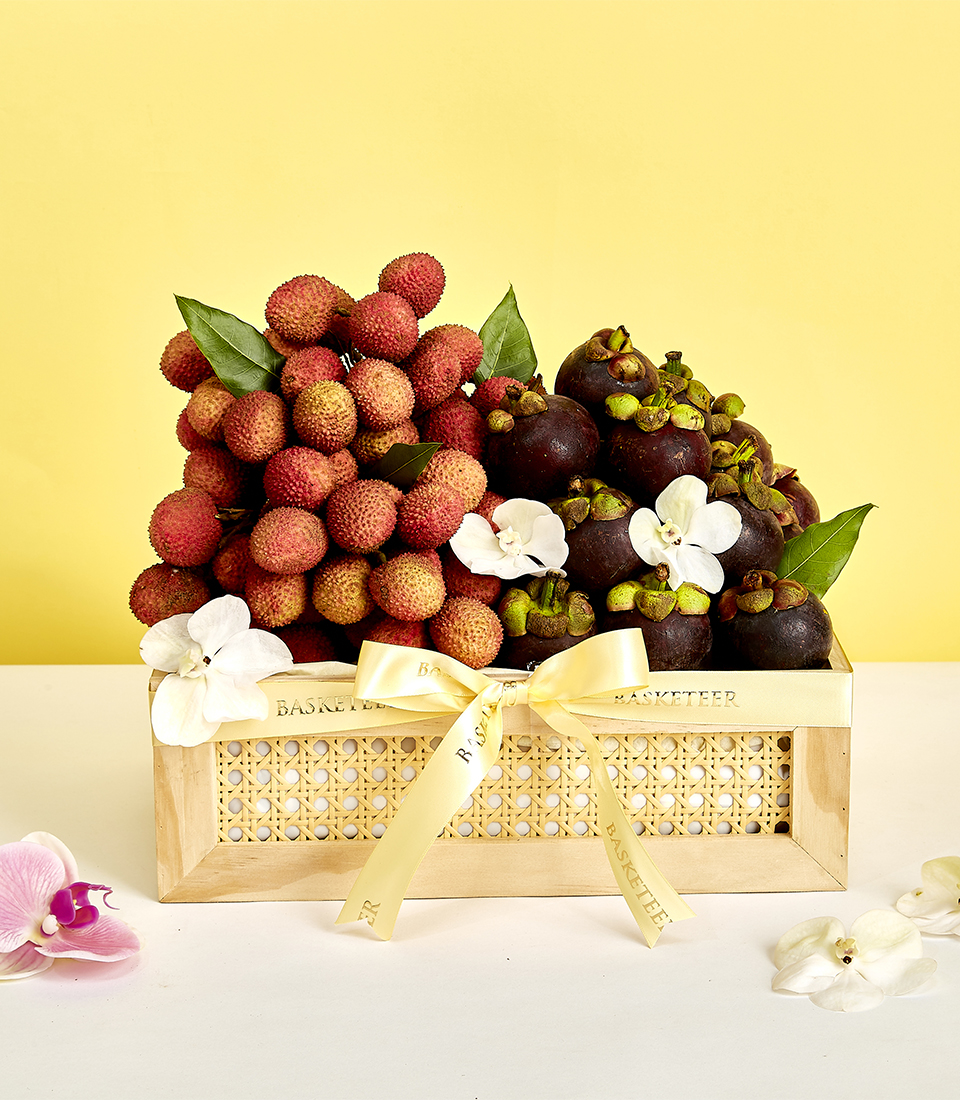 Experience the taste of Thai summer with our Mangosteen Lychee Wooden Box. Packed with juicy mangosteens and succulent lychees, this gift basket offers a delightful blend of tropical flavors. Order now and savor the essence of Thailand!