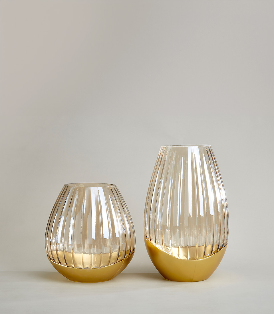 Set of Two Ribbed glass vase with a golden metallic base, featuring a sleek, tapered design and clear finish, on a light grey background