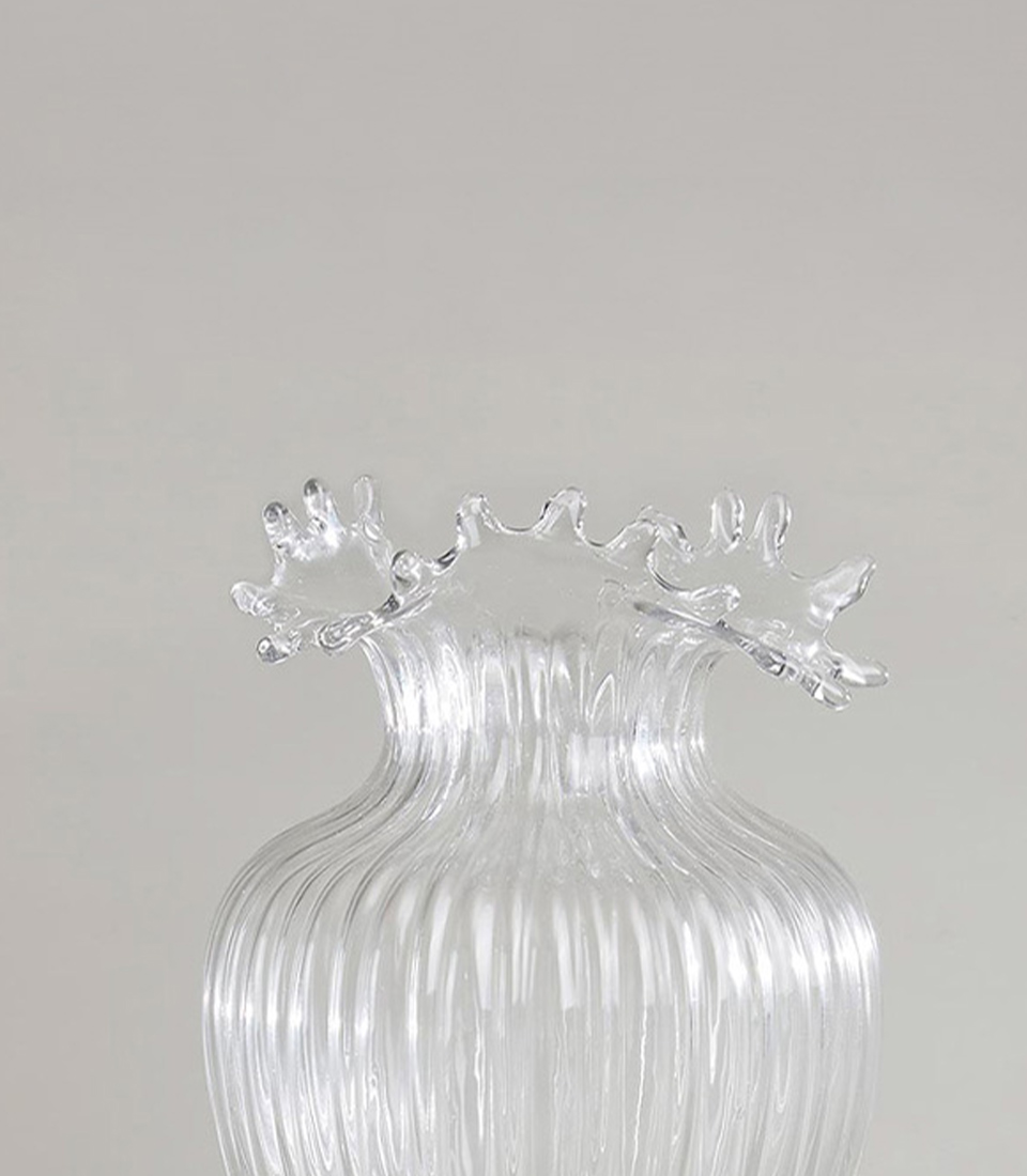 Close-up of Clear Ribbed Glass Vase with Fluted Top Close-Up