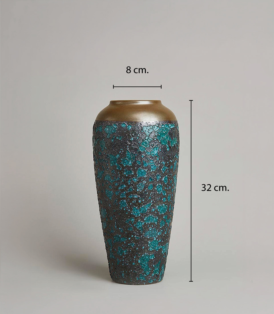 32 cm tall textured ceramic vase with an 8 cm opening, featuring a turquoise and black speckled design with a gold rim, on a light grey background.