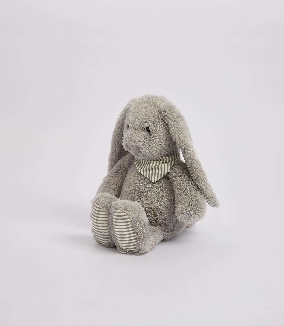 Gray plush bunny with striped bandana, standing upright on a white background.