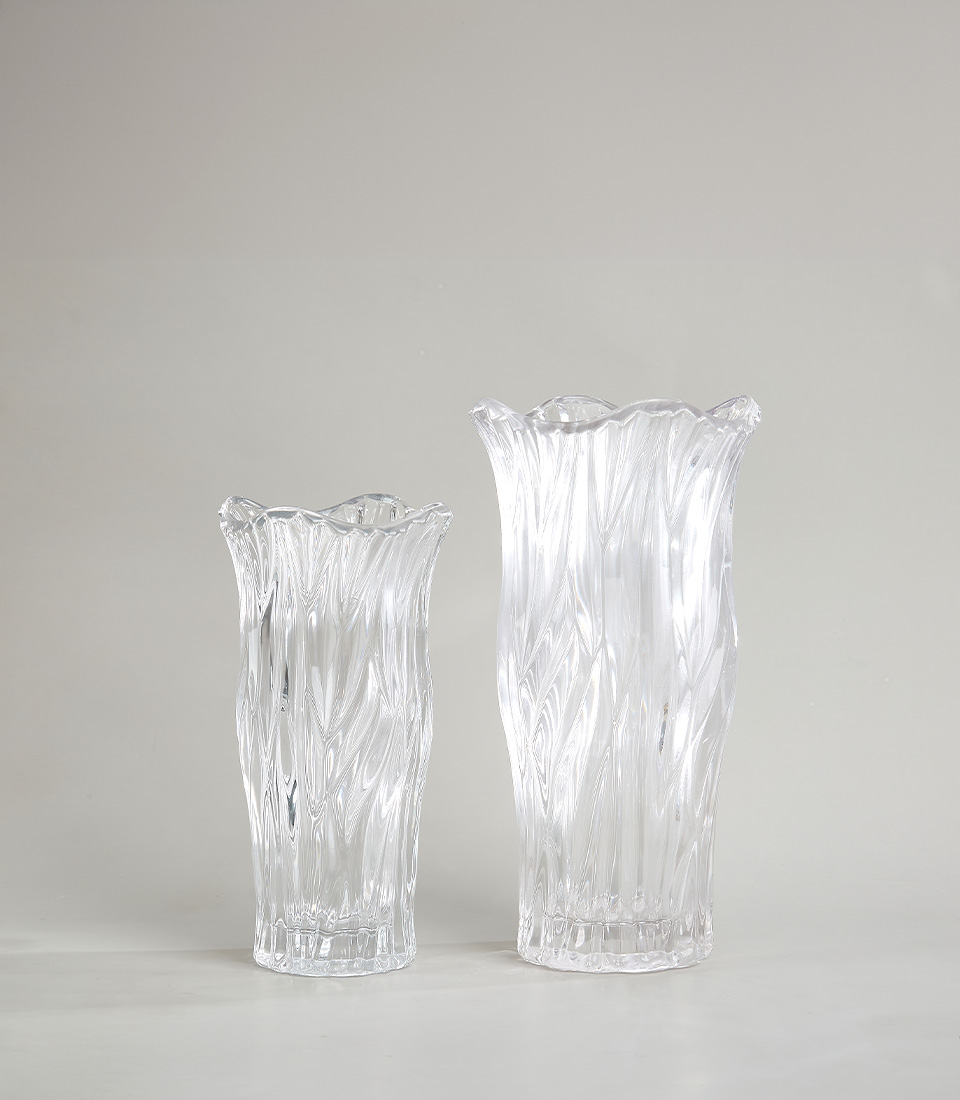 Crystal Clear Wave Glass Vase with intricate flowing wave patterns, perfect for adding elegance and sophistication to any room.