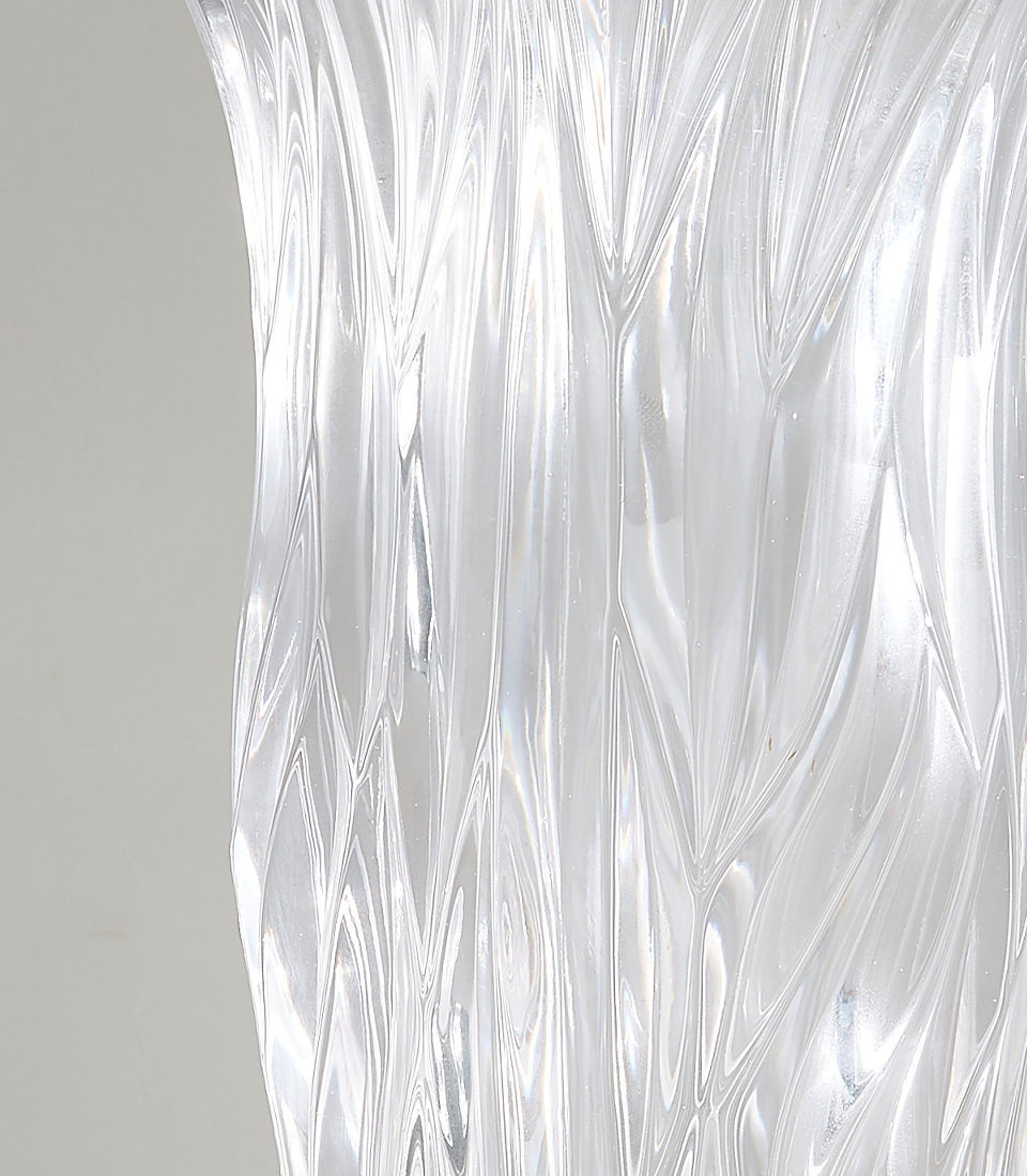 Crystal Clear Wave Glass Vase with intricate flowing wave patterns, perfect for adding elegance and sophistication to any room.