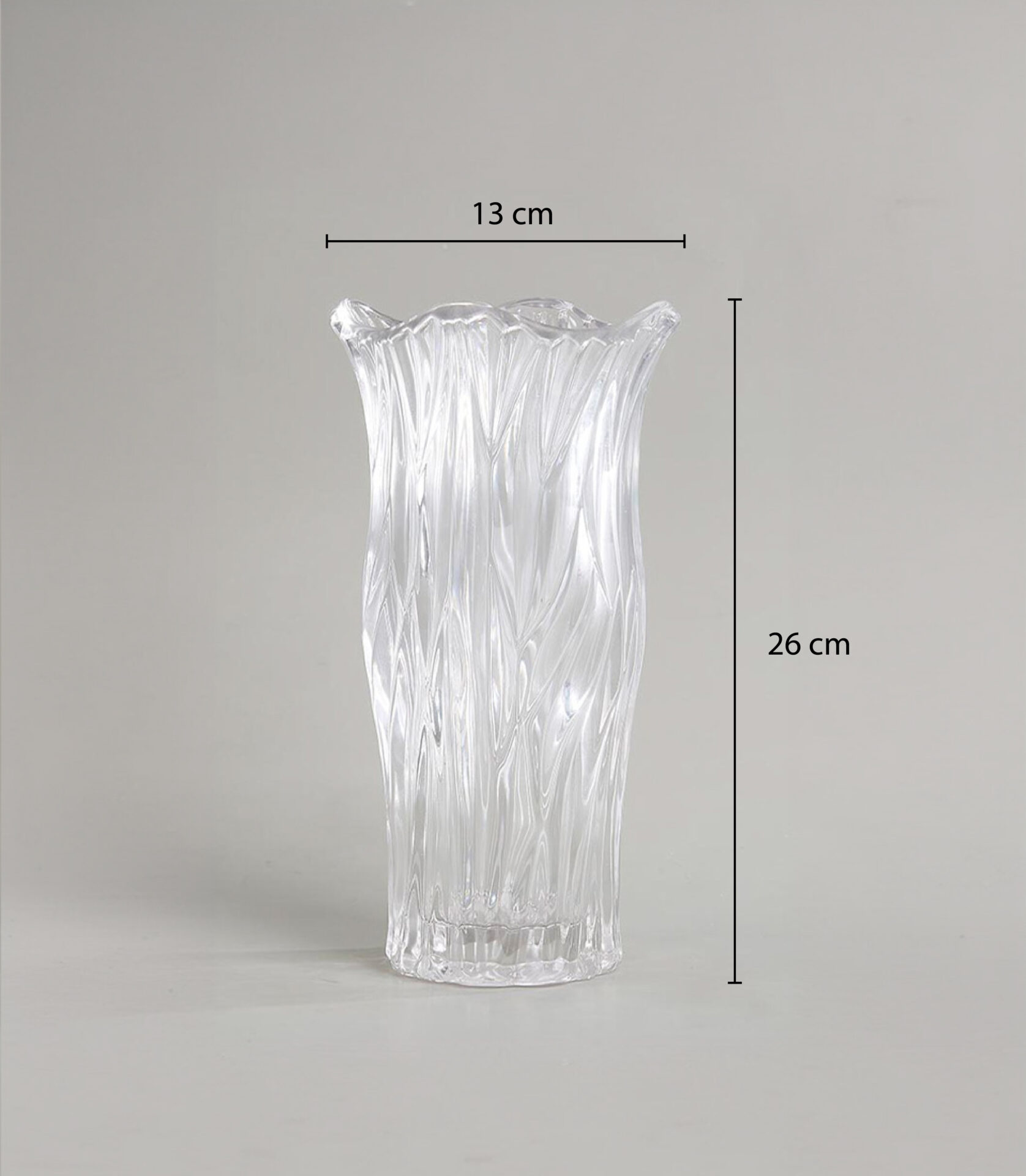 Crystal Clear Wave Glass Vase with intricate flowing wave patterns, perfect for adding elegance and sophistication to any room.