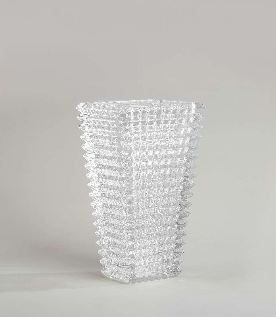 Textured crystal glass rectangular vase with intricate patterns, perfect for adding modern elegance and sophistication to any decor.