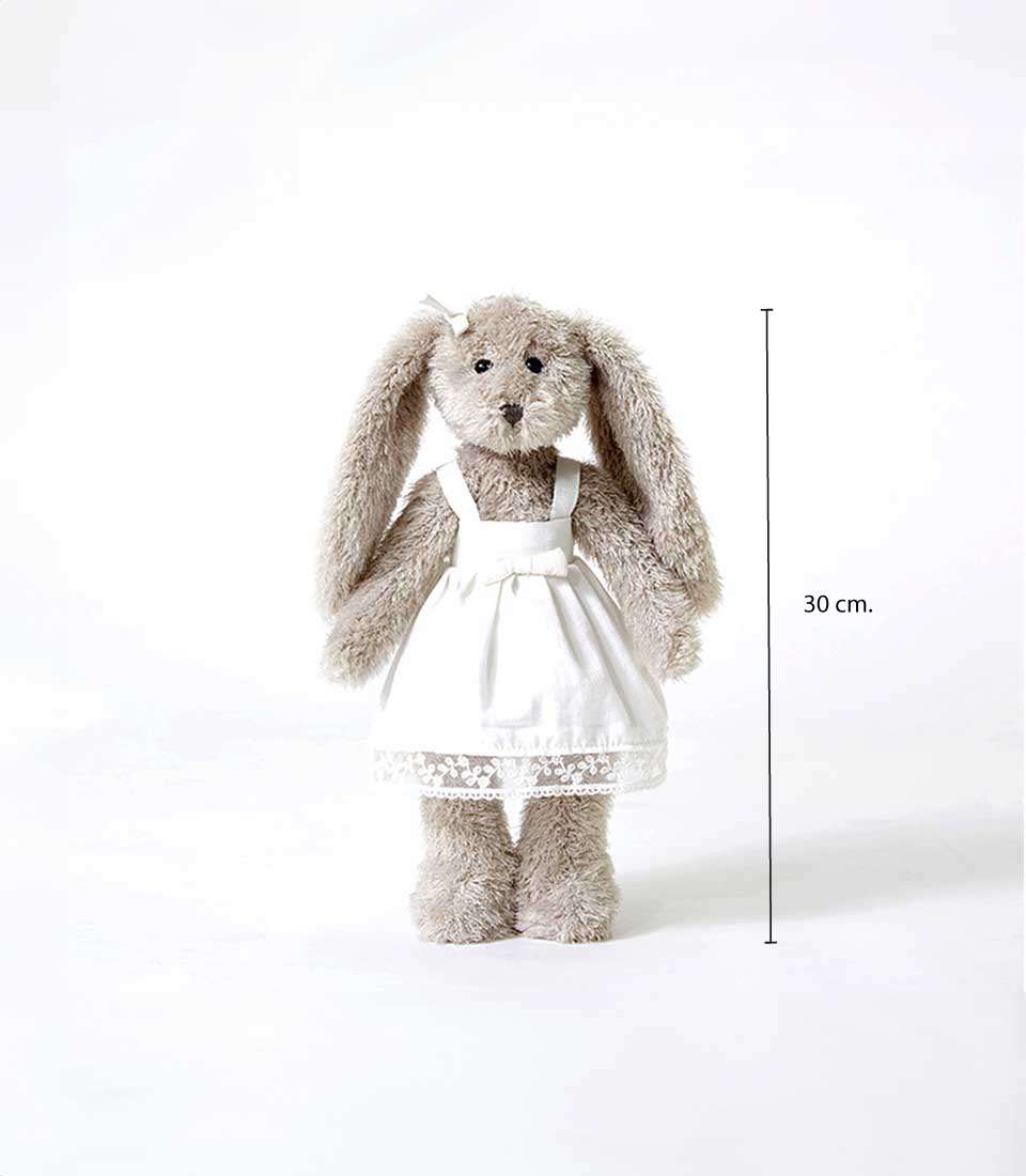Gray plush bunny wearing a white dress with lace details, standing against a white background, height of 30 cm.