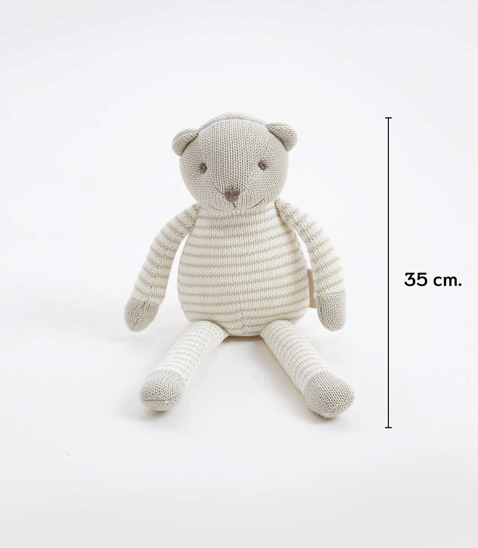 A gray striped knitted teddy bear with cream accents is sitting upright against a plain white background. The bear, one of the soft toys collection, is approximately 35 cm tall, as indicated by a measurement mark on the right side of the image.