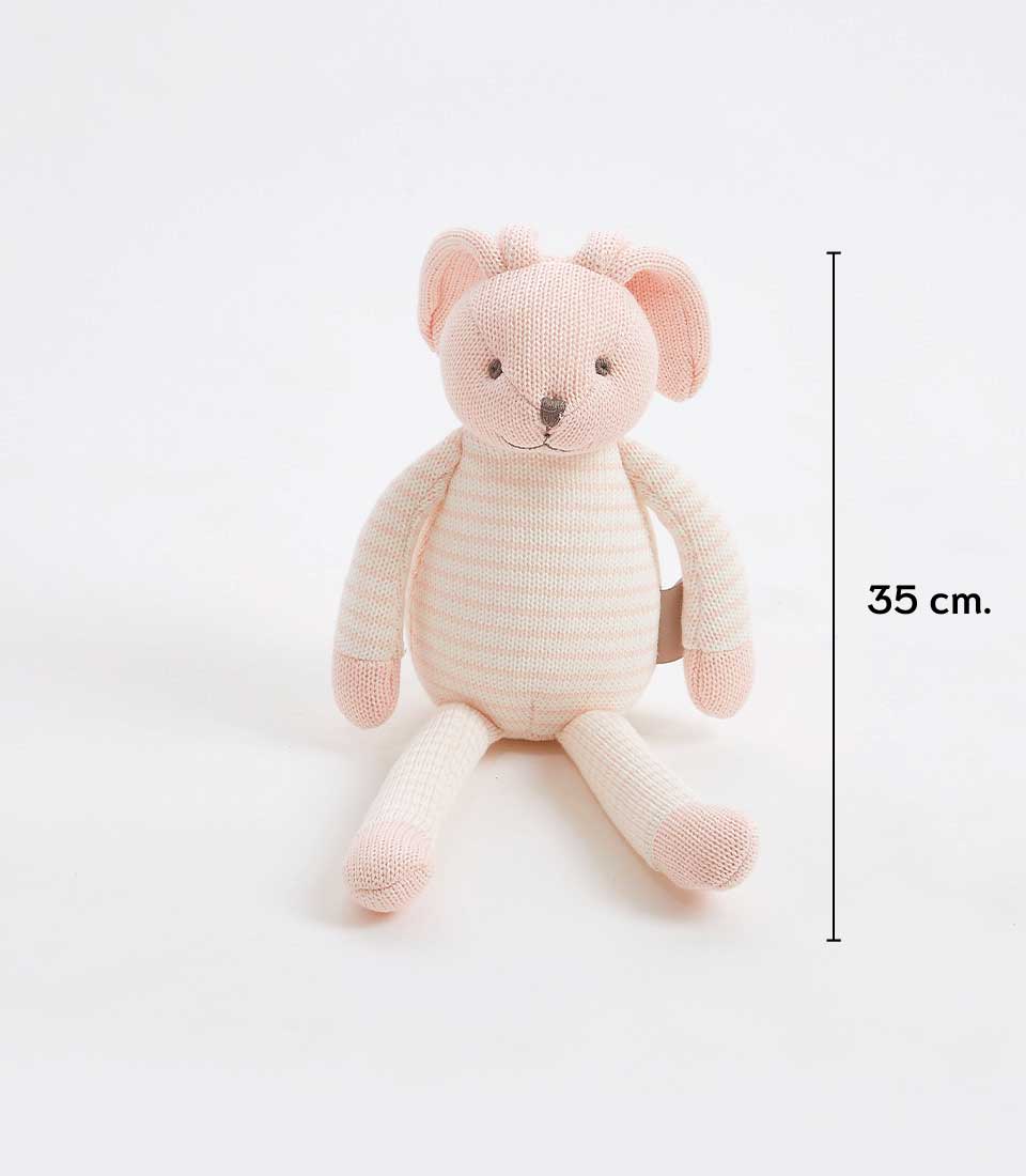 A cuddly striped pink bunny with round ears, a smiling face, and long limbs sits gracefully on a white surface. This knitted soft toy stands 35 cm tall, clearly marked with a vertical line for measurement, making it the perfect addition to any collection of soft toys.