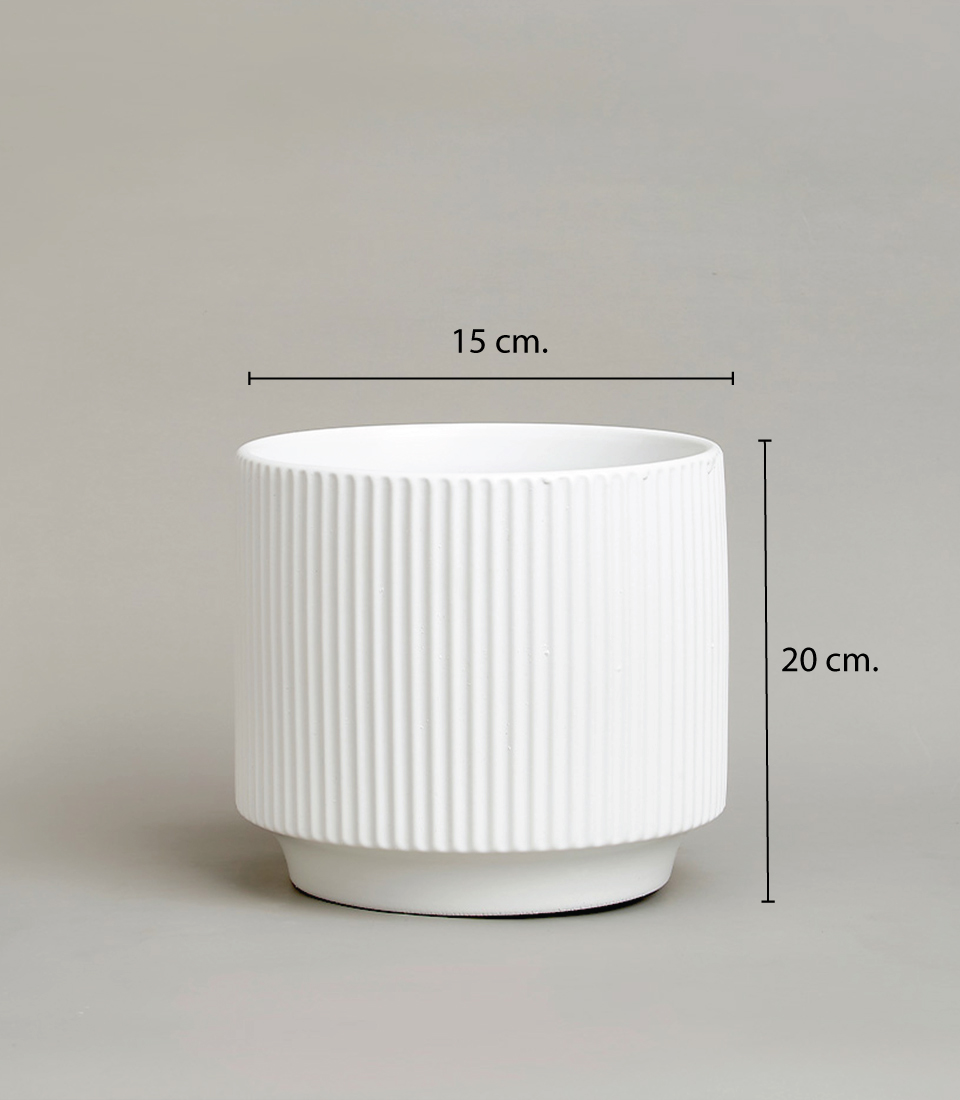 White ribbed ceramic vase with a modern design against a neutral background with dimensions 15 cm in diameter and 20 cm in height.