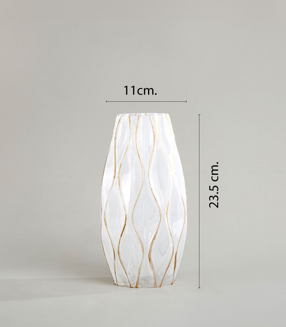 White ceramic vase with gold accents and wavy design against a neutral background. with a diameter of 11 cm and height of 23.5 cm.
