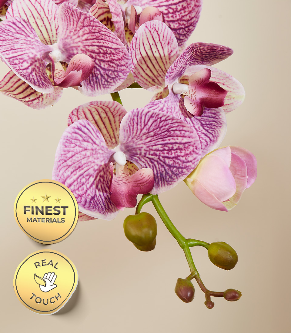 Close-up of a pink Real Touch orchid flower with green buds, showcasing the finest materials and realistic texture.