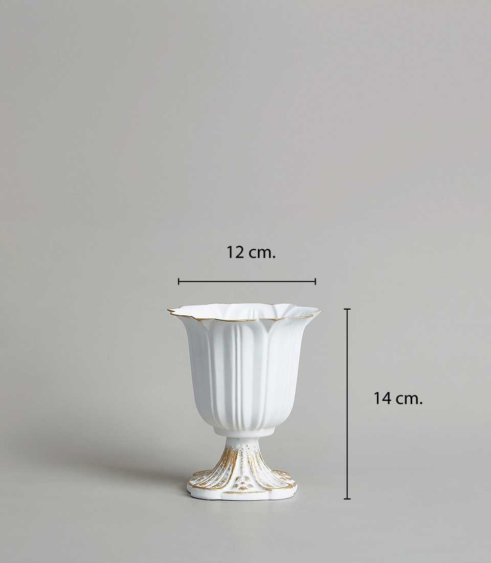 Elegant stainless steel vase with gold detailing and a fluted design, measuring 14 cm. in height and 12 cm. in diameter, on a light grey background.