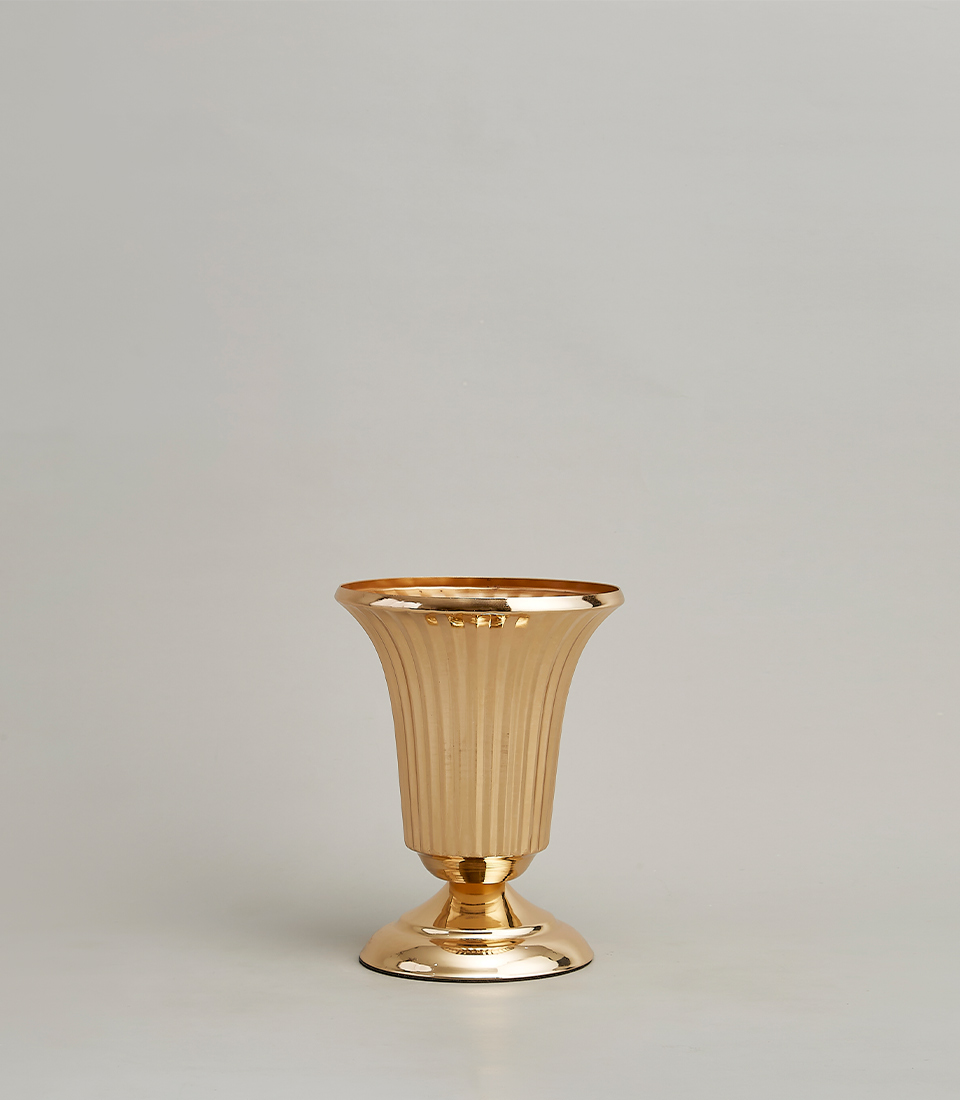 Luxurious gold-plated stainless steel vase with a modern fluted design, on a light grey background.
