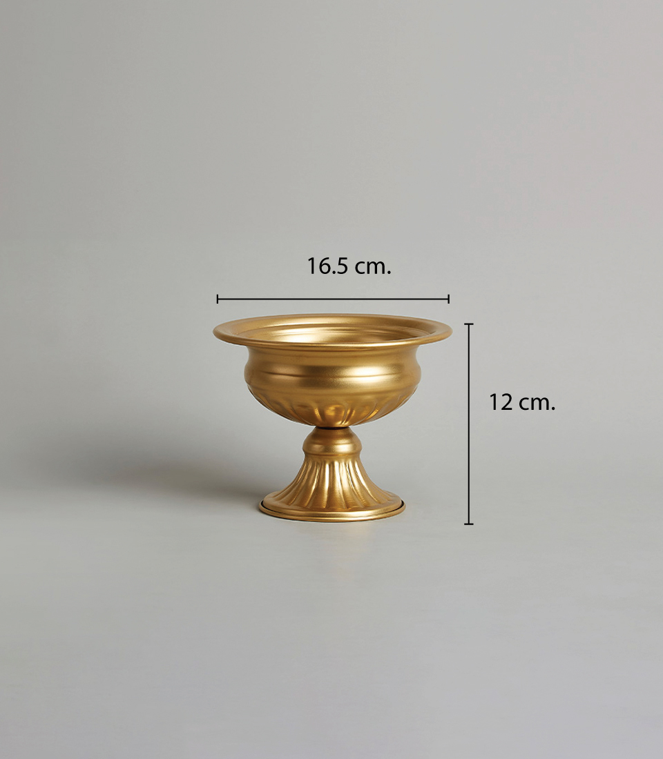 Elegant gold steel pedestal vase with a wide bowl and fluted base design, measuring 12 cm. in height and 16.5 cm. on a light grey background.