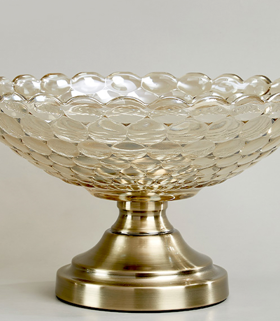 Close-up of Elegant crystal mirror vase with a textured design and a polished metal base on a white background.