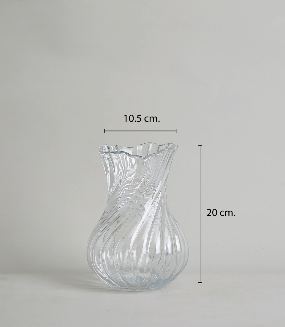 Close-up of Elegant crystal vase with a swirl design, 20 cm. tall and 10.5 cm. wide, on a white background.Close-up of Elegant crystal vase with a swirl design, 20 cm. tall and 10.5 cm. wide, on a white background.