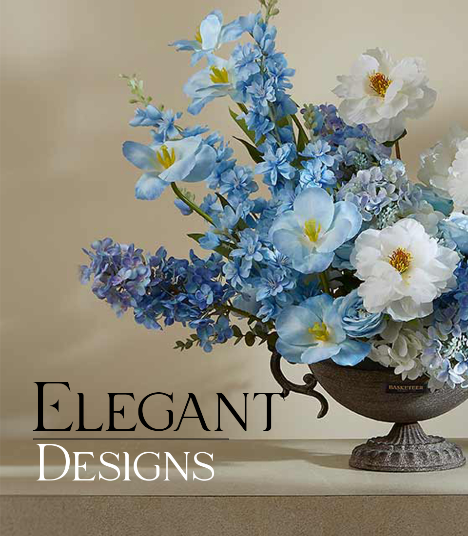 Artificial blue and white floral arrangement in an ornate pedestal vase on a beige table with text 