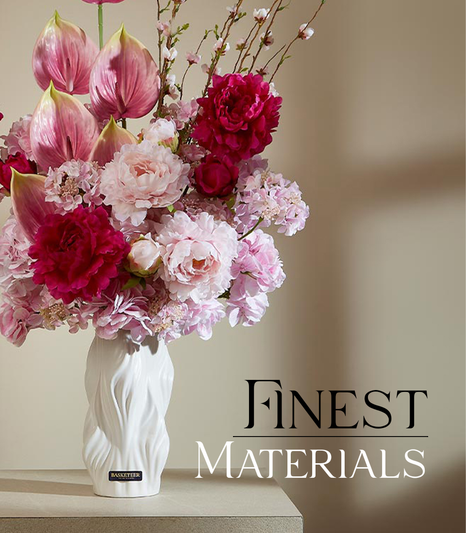 Artificial flower arrangement in a white wave-design vase, featuring vibrant pink and deep burgundy blossoms with text 