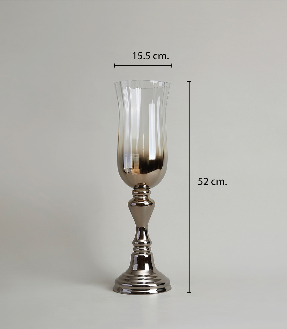 Tall ombre silver glass vase with a pedestal base, featuring a sleek reflective finish transitioning to a smoky gradient, on a light gray background, 15.5 cm Diameter and 52 cm. Height.