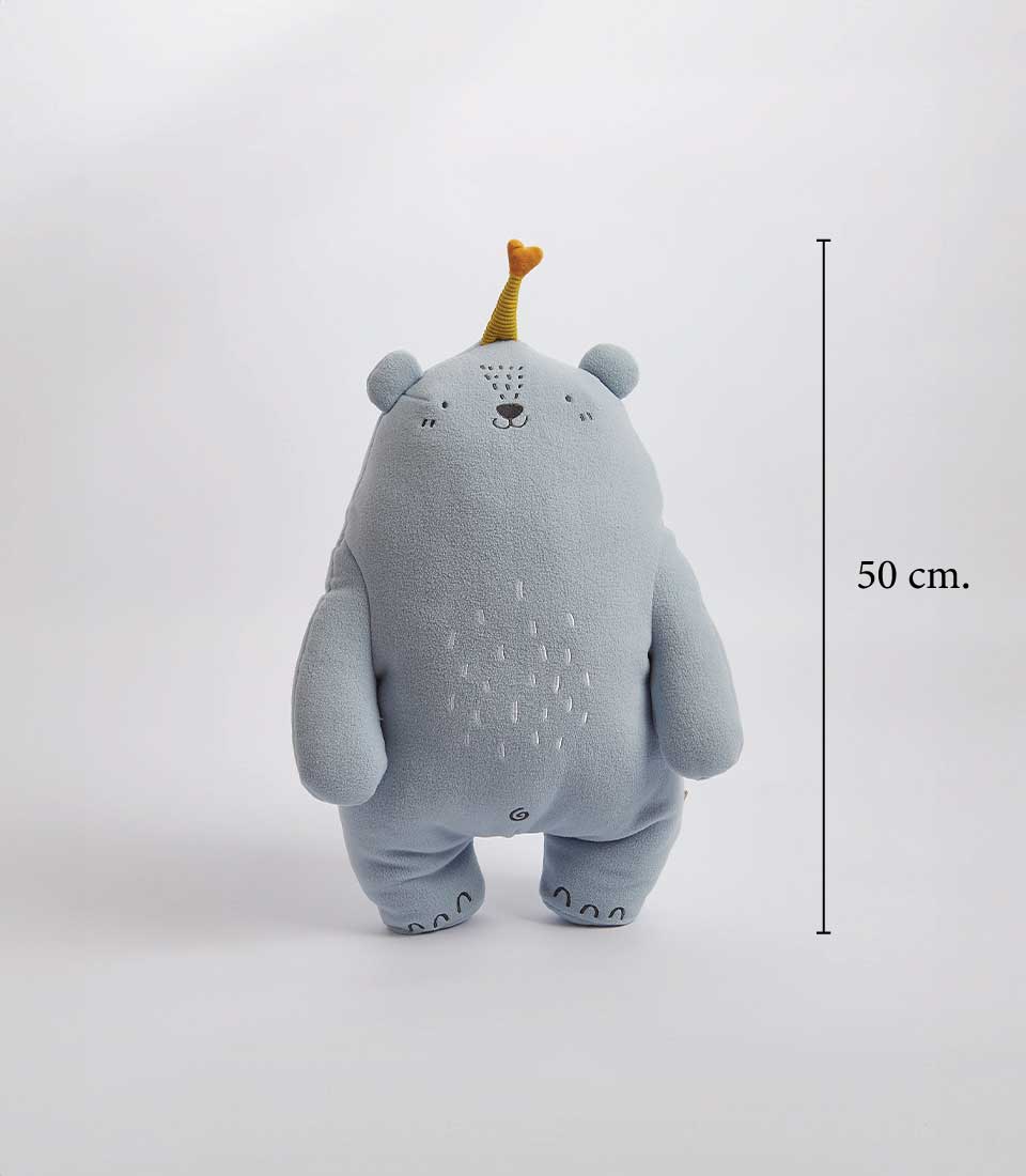 A charming blue bear plush toy wearing a small yellow party hat, on a white background, height of 50 cm.