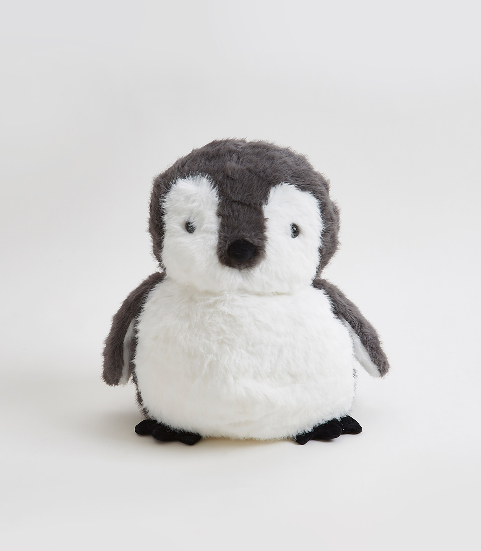 Large, black and white penguin plush toy with soft fur