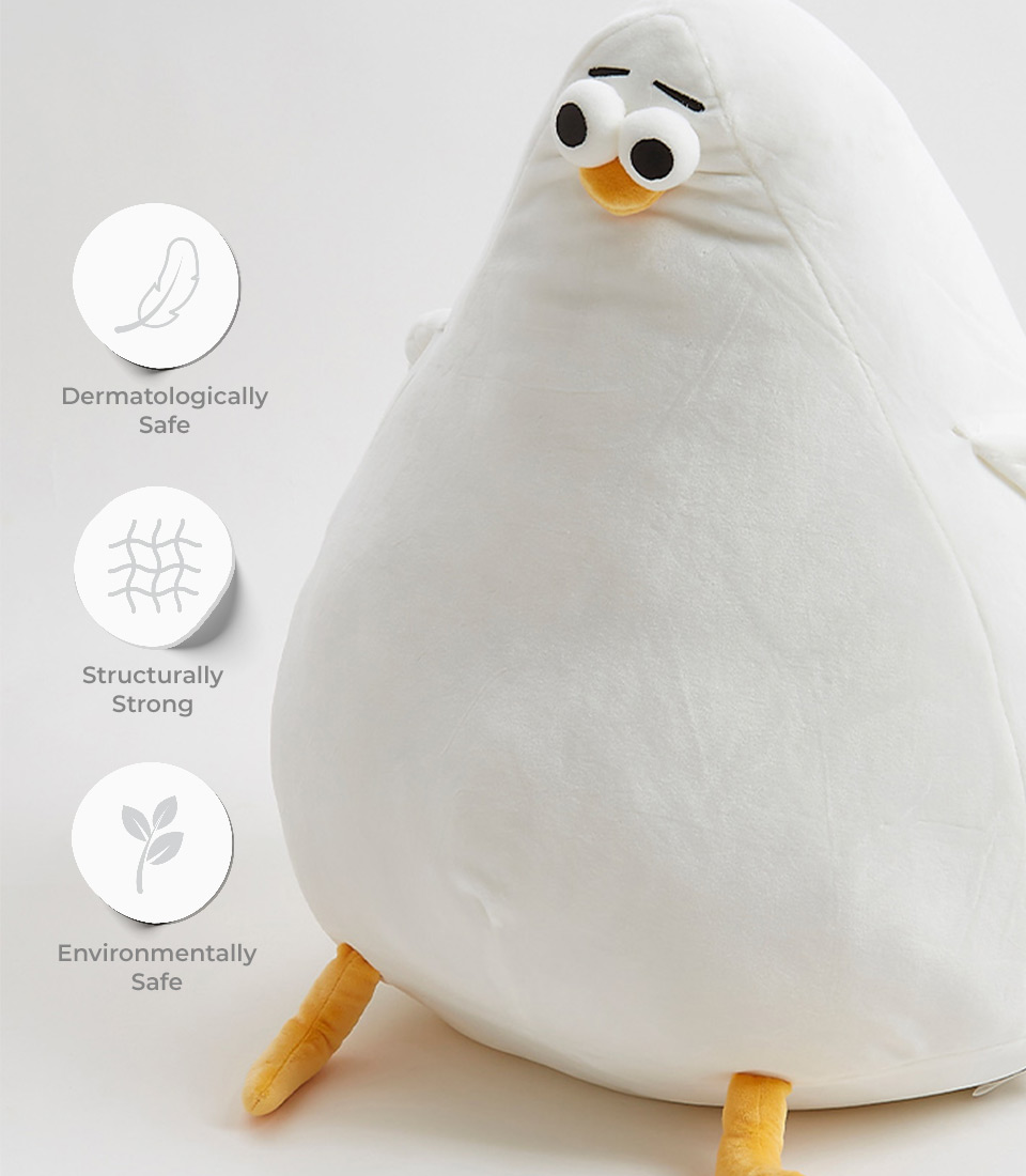 Close-up of a fluffy white bird plush toy with yellow beak and feet, showcasing its dermatologically safe, structurally strong, and environmentally safe features.