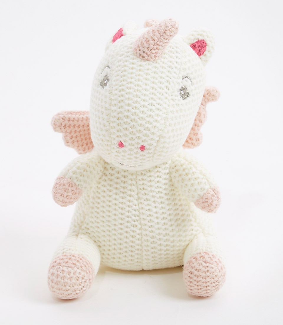 Handcrafted crocheted unicorn plush toy with a soft cream exterior, pastel pink accents on the hooves, mane, and tail, and a friendly face with embroidered eyes. Ideal for newborns and young children.
