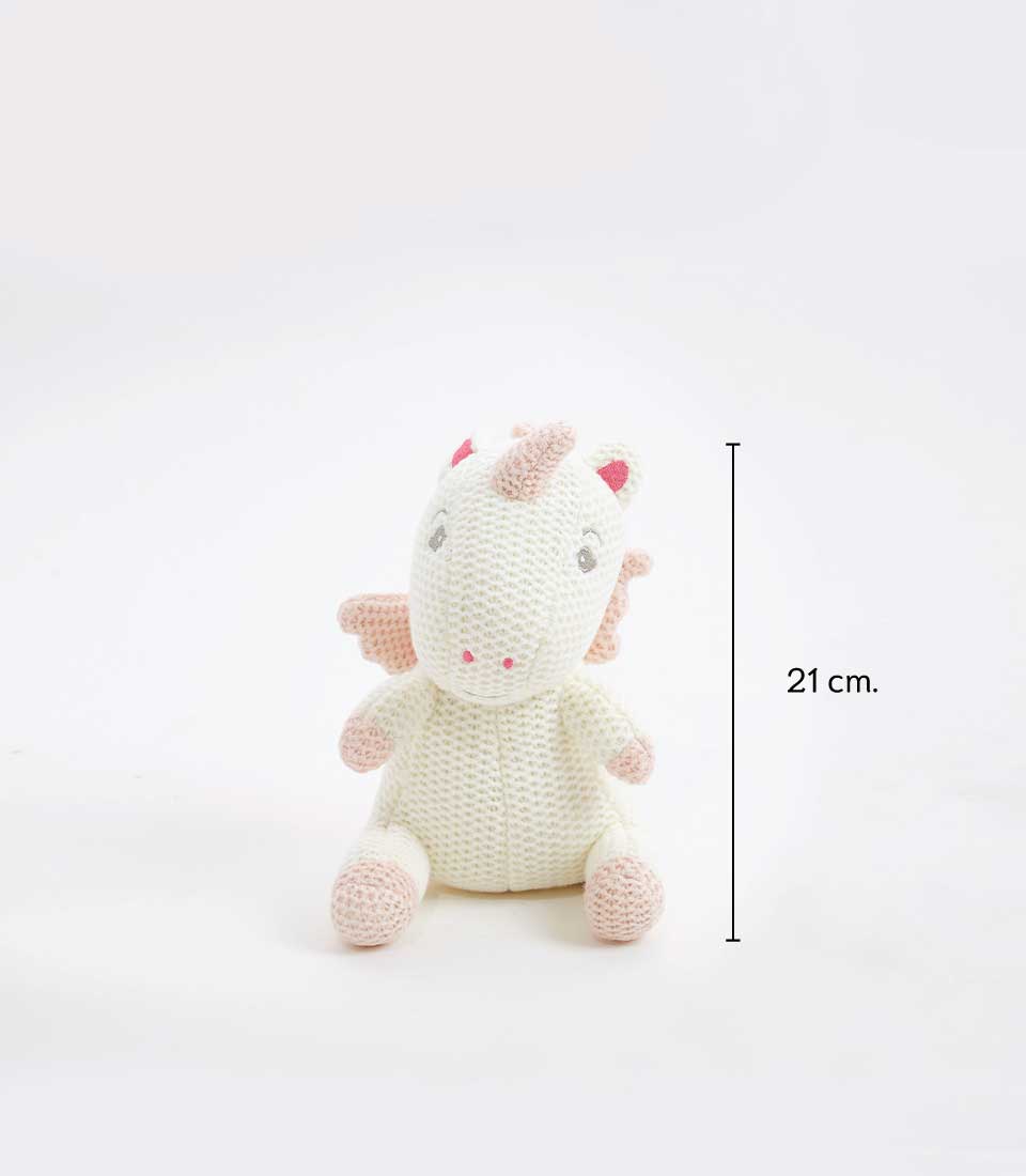 Handcrafted crocheted unicorn plush toy, 21 cm tall, with a soft cream exterior and pastel pink accents on the hooves, mane, and tail. The toy features a friendly face with embroidered eyes and is ideal for newborns and young children.
