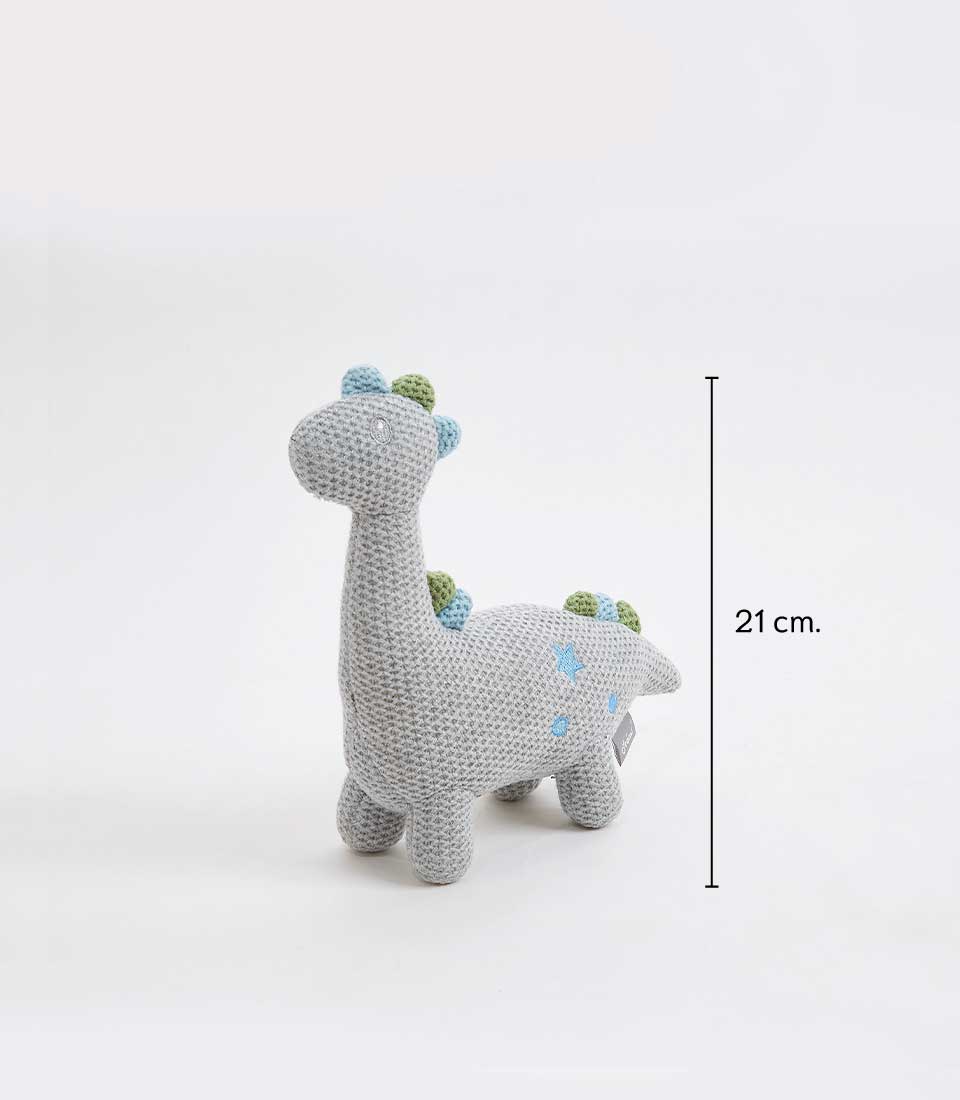 Handcrafted crocheted dinosaur plush toy, 21 cm tall, with a soft grey exterior, pastel blue and green accents, and a friendly design. Ideal for newborns and young children.