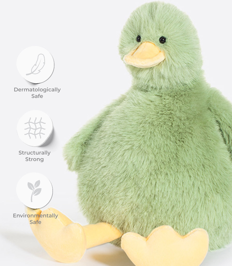A plush green duck toy with yellow beak and feet is shown. Beside the toy are three icons with text: a feather icon labeled 