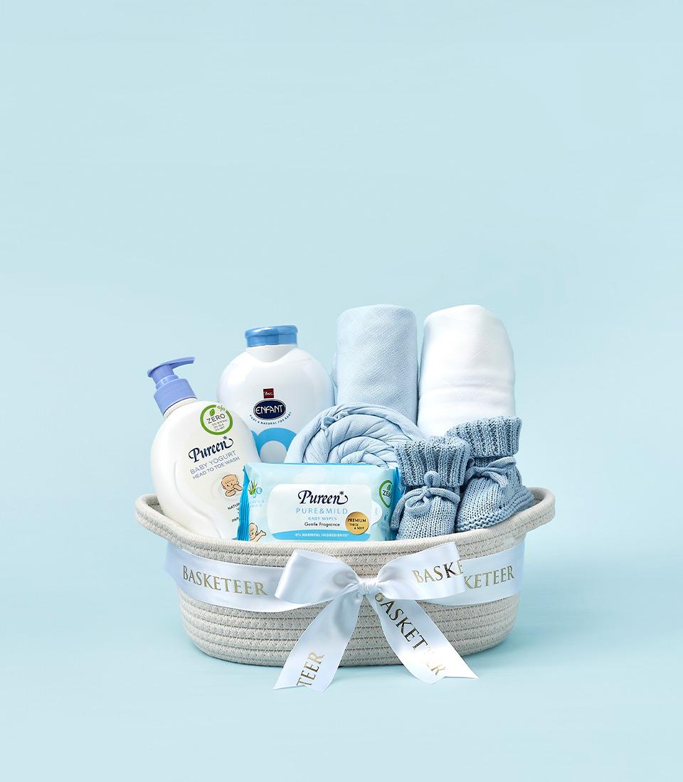 A white basket with gold 