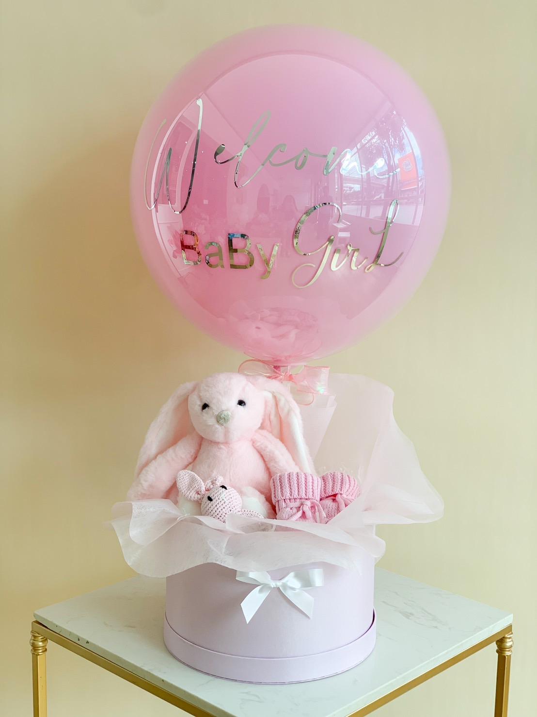 A large pink balloon with 