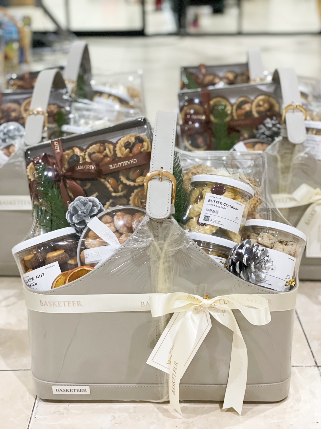 A gift basket with assorted cookies and snacks.