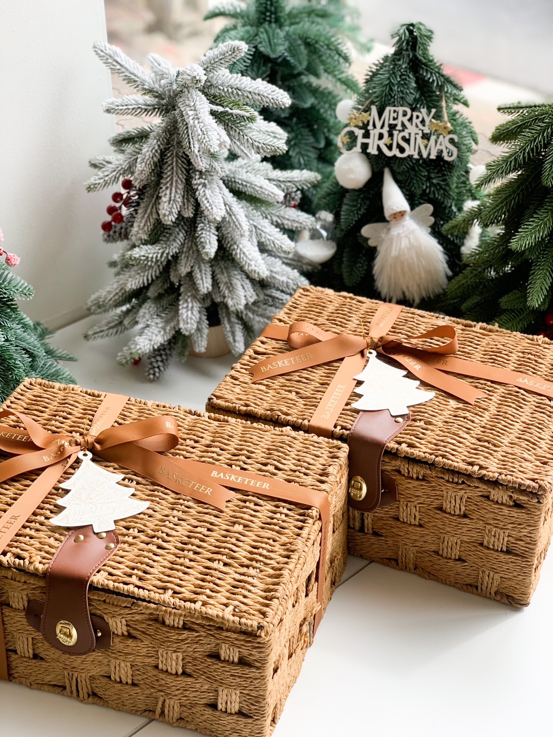 A gift picnic basket with assorted snacks and beverages.