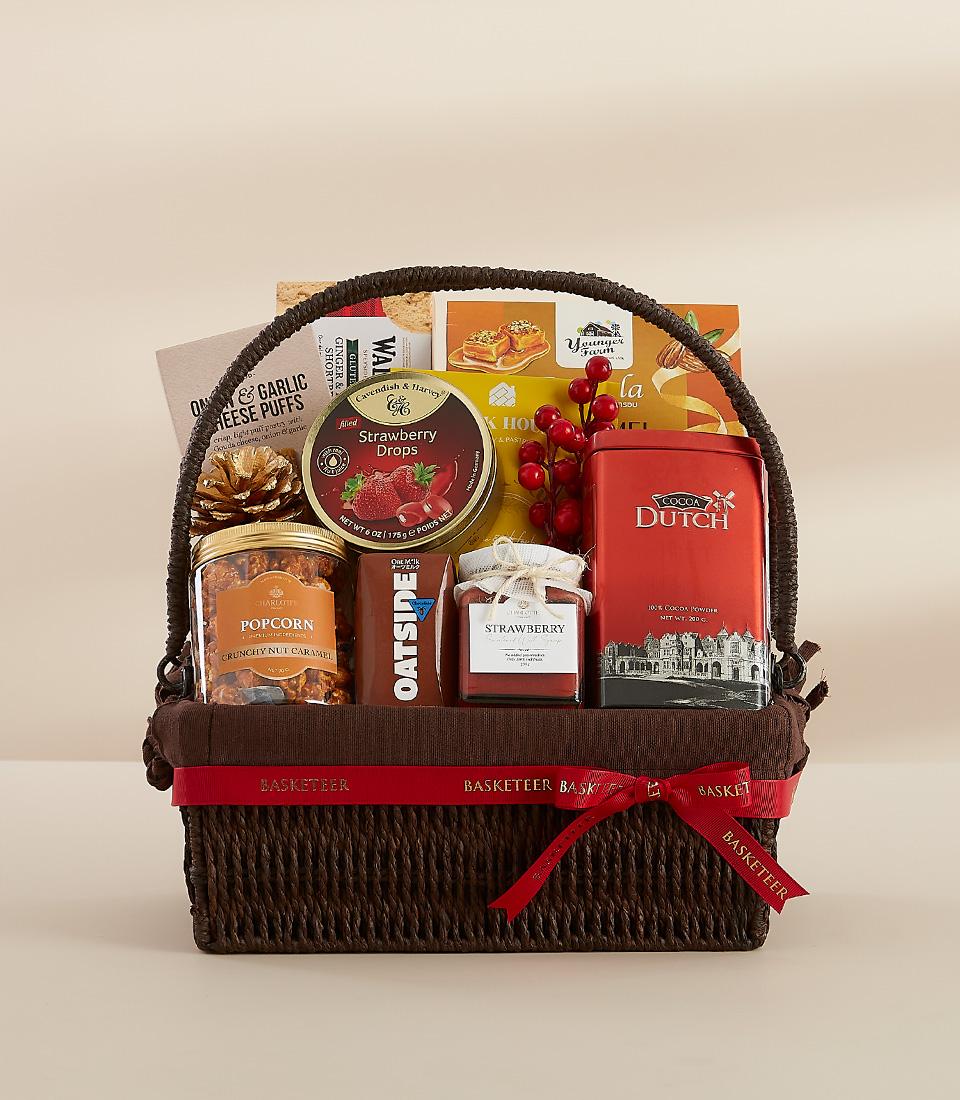 A holiday gift basket containing indulgent food items, perfect for gifting or enjoying yourself.