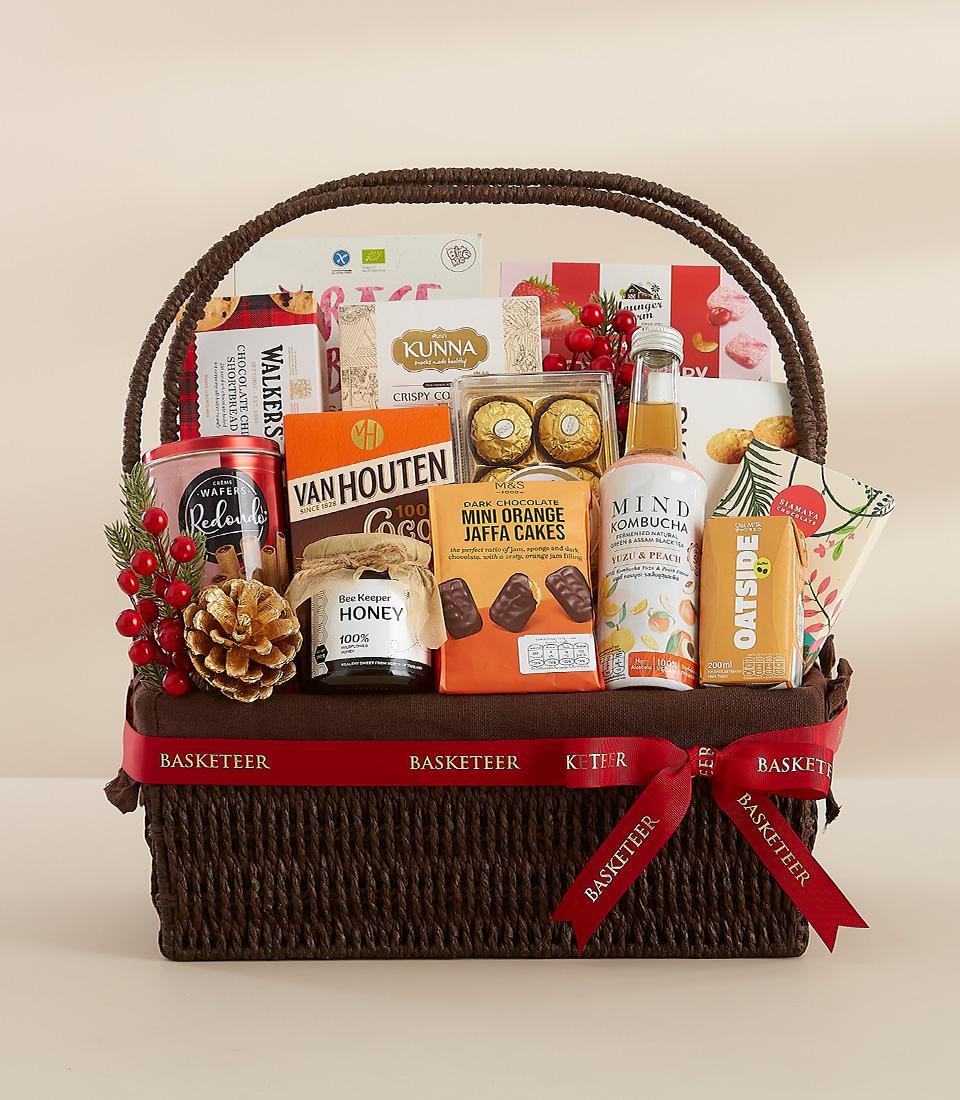 A holiday gift basket containing indulgent food items, perfect for gifting or enjoying yourself.
