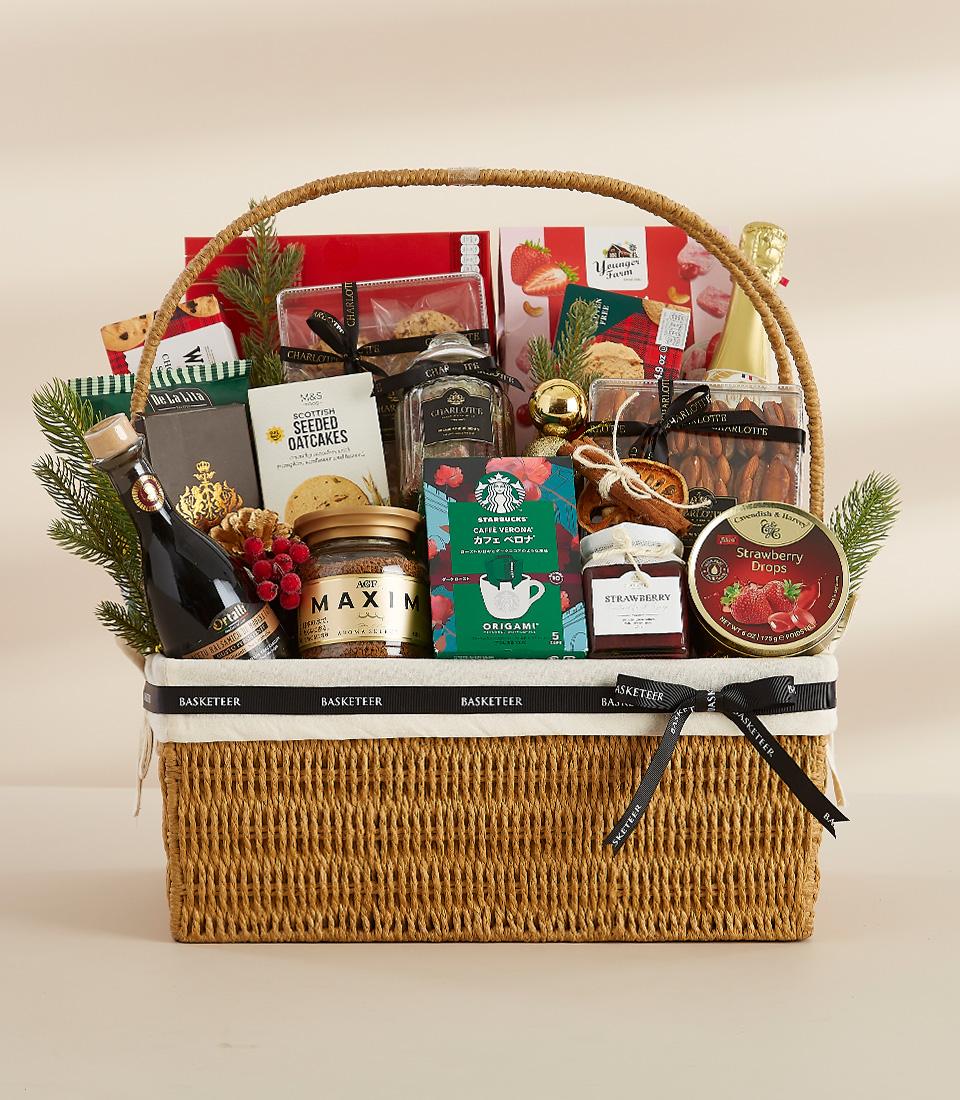 A holiday gift basket containing indulgent food items, perfect for gifting or enjoying yourself.