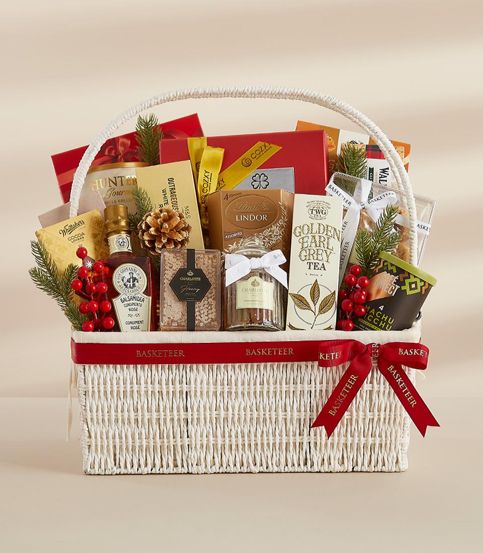 A festive gift basket featuring a selection of sweet , perfect for sharing with loved ones.